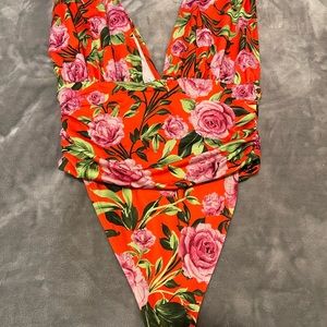 This is a nice Zara’s bodysuit. It is brand new never been worn very comfortable